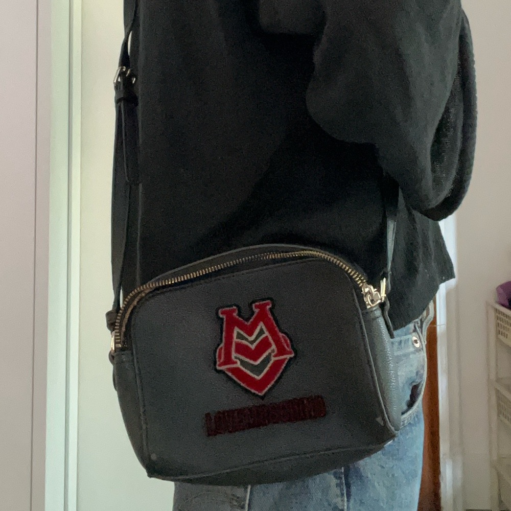 LOVE MOSCHINO black purse with red fuzzy heart logo patch